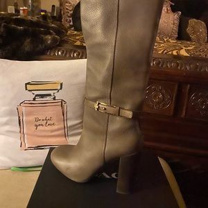 Grey slightly used all  leather boots